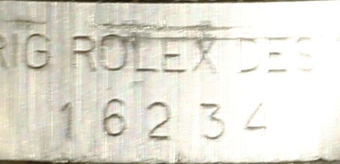 16234