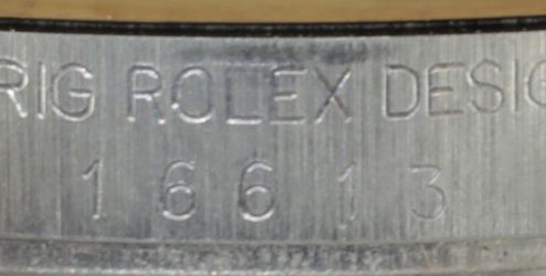 16613